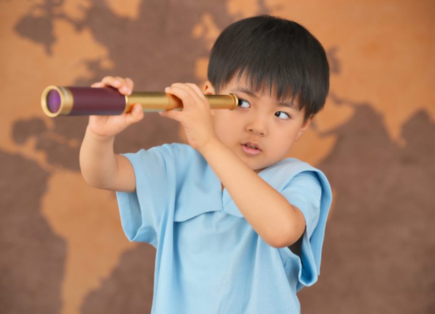 Child with a telescope